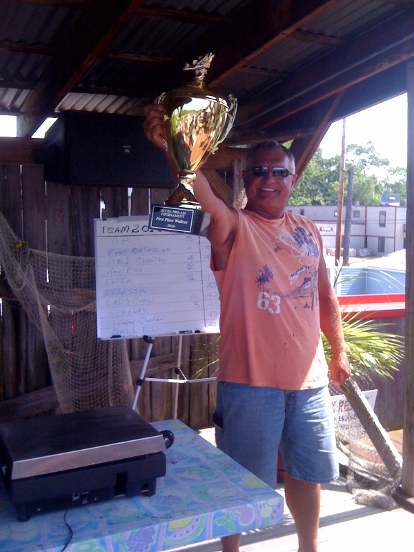 Captain Marv of Evil Eye Charters at the scales wins the 2010 NCCBA Lake Erie Walleye Fishing Tournament