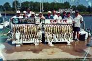 Group of fishermen pose with Lake Erie catch of the day.