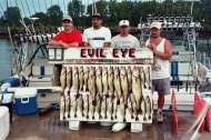 Evil Eye clients show off a great catch of fish.