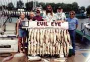 A group of six display their limit of 30 walleye.