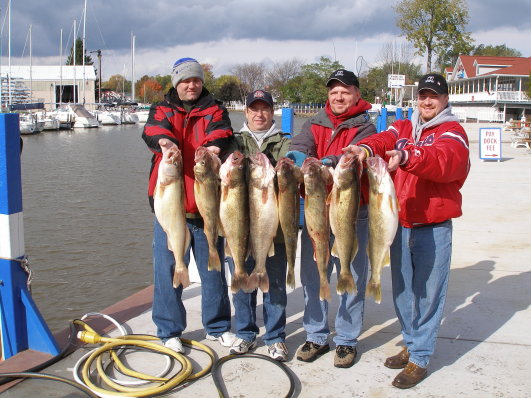 Four fishermen hold out 8 monster walleyes caught on Lake Erie Ohio