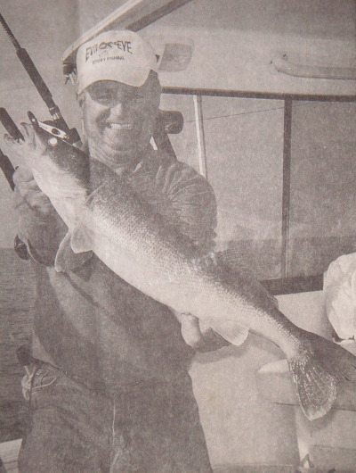 Lake Erie charter boat captain Marv DeGreen of Huntsburg Township holds a plump Central Basin walleye.
